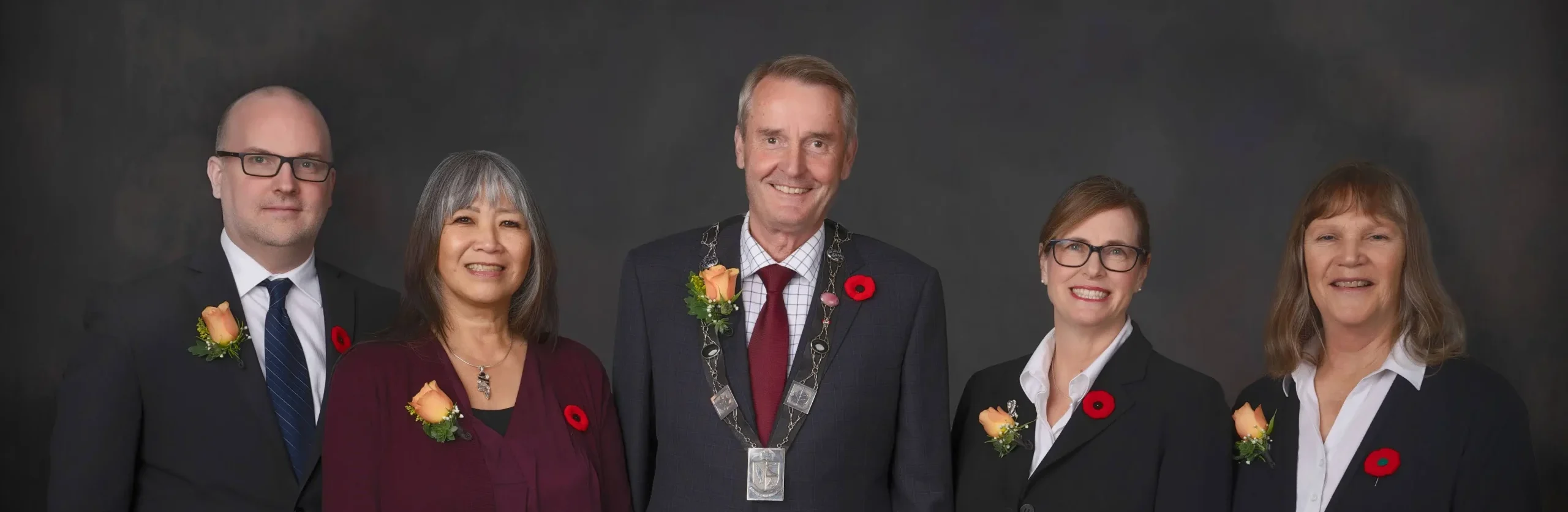 The Mayor and Councillors are photographed in front of a dark background. Members of Council from left to right are Councillor Scott Harrison, Councillor Jean Young, Mayor Teunis Westbroek, Councillor Anne Skipsey and Councillor Petronella Vander Valk.